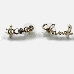 Authentic CHANEL Coco Chanel logo earrings with gold hardware Brand New